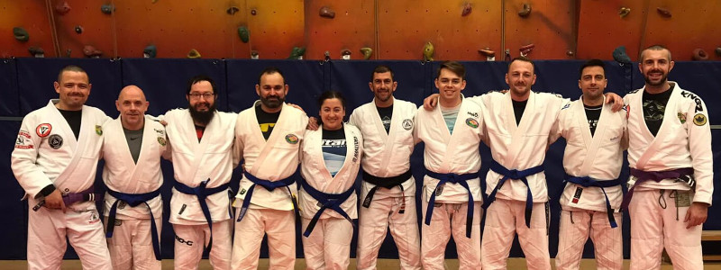 Robin French wIth Professor Allan Manganello, Peter Squire, and New TPSUK Blue Belts - Nov 2019